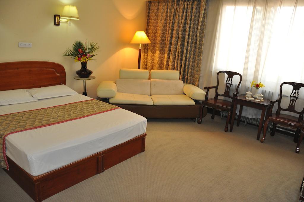 Gan Jin Hotel Tiencsin Szoba fotó