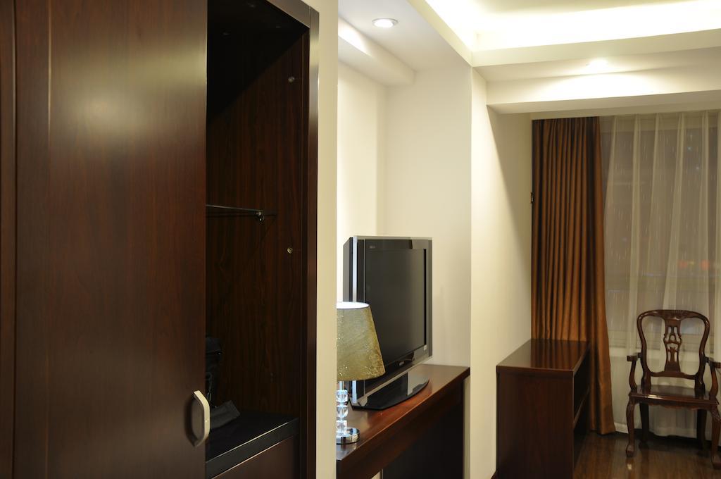 Gan Jin Hotel Tiencsin Szoba fotó
