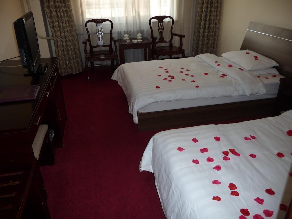 Gan Jin Hotel Tiencsin Szoba fotó