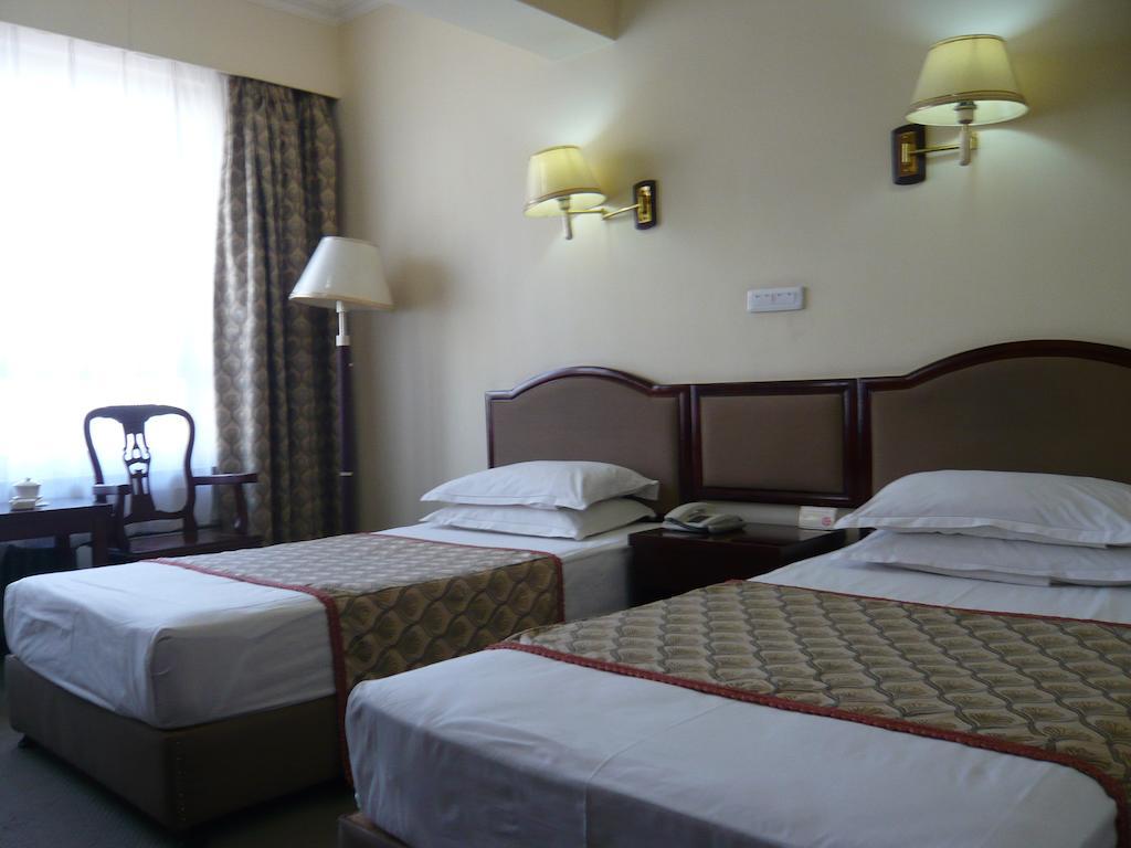 Gan Jin Hotel Tiencsin Szoba fotó