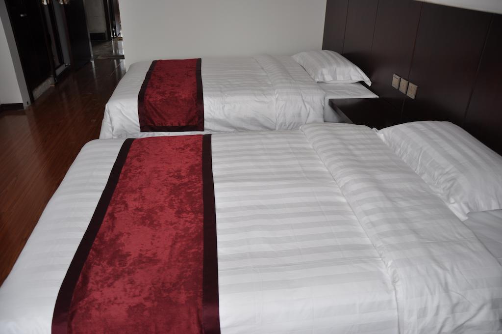 Gan Jin Hotel Tiencsin Szoba fotó